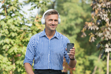Remote Productivity Tips to Better Work. Coffee break. Reward yourself and encourage. Man drinking...