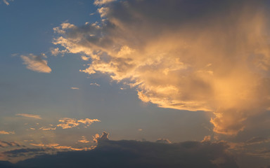 Naklejka na ściany i meble blue sky with golden orange cloud sunset