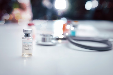 Sample of coronavirus vaccine (COVID-19) on work table in a medical lab.