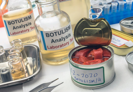 Experienced laboratory scientist analyzes red peppers from a canned food can to analyze botulism infection in sick people, conceptual image