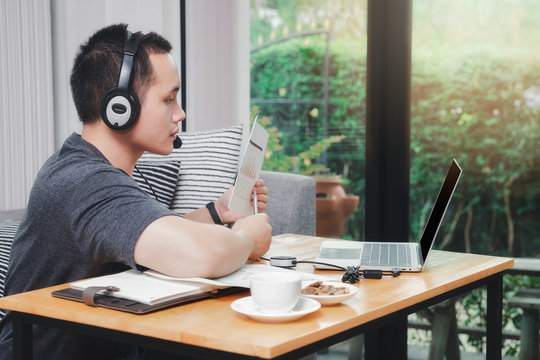 Businessmen present earnings report, the monthly college budget and financial chart to colleagues in remotely conference. Businessman video call with clients on laptop in home office.