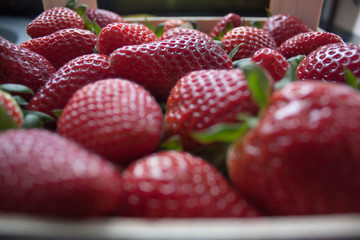 close-up of a pile of strawberries front view





