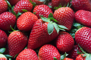 close-up of a pile of strawberries, zenithal view


