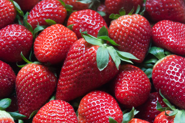 close-up of a pile of strawberries, zenithal view


