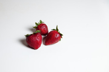 strawberries on a white table