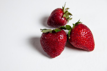 strawberries on a white table