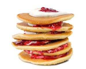 Stack of pancakes with sour cream and raspberry jam on white background