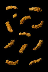 Flying chicken strips nuggets isolated