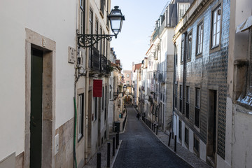 Fototapeta na wymiar Alleyway in the old town of Lisbon, Portugal