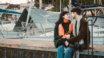 Two lovers in a harbor on the lake