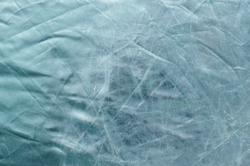 Obraz premium Foiled background silver, turquoise color mauled with shadows