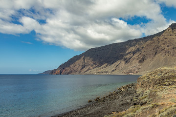 Wide angle panorama. Natural beach Las Playas. Very popular for tourists and locals. There you can look at the Roque de Bonanza is one of the symbols of El Hierro island and its natives. El Hierro