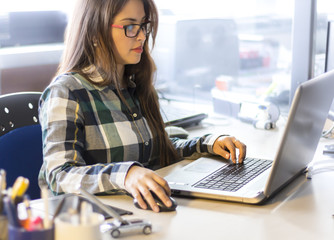 Beautiful latina girl work from home with her PC