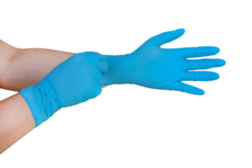 Hands are wearing blue medical gloves isolated on white background, clipping path included