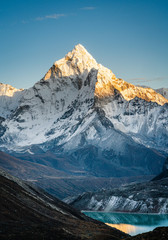 Ama Dablam mountain peak during sunset - obrazy, fototapety, plakaty