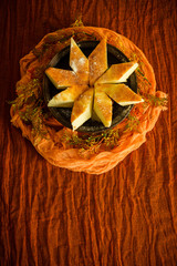 
Cheesecake on an orange background. Homemade pastries.