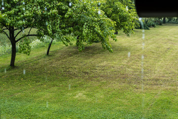 Raindrops falling  from the roof, rainy day concept