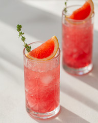 Crushed ice cold refreshing cocktail with grapefruit. Cold summer cocktail.