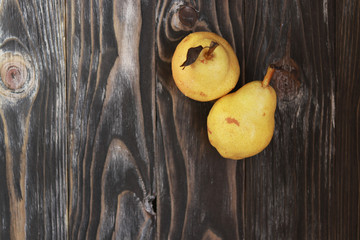 ripe apples on wooden background