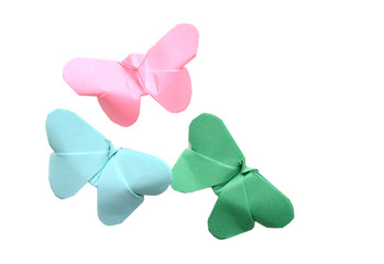 Colorful origami butterflies on whtie