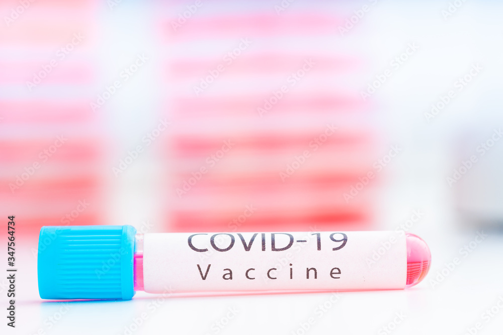 Poster Coronavirus Covid-19 vaccine vial in medical lab, immunization and treatment from coronavirus (Covid-19) medical equipment concept