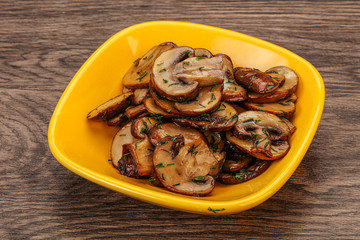 Roasted champignon with herbs and spices