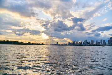 Naklejka premium sunset over the river