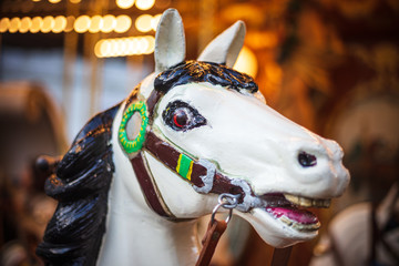 Fototapeta na wymiar Ancient German Horse Carousel built in 1896 in Navona Square, Rome, Italy