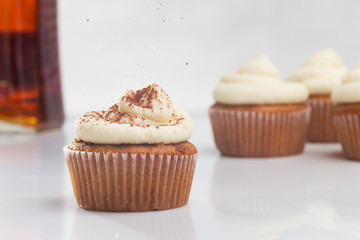 Tiramisu cupcake on white background