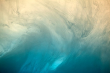 Abstract color background. Liquid background with floating paint in a water. Psychedelic and art concept