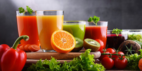 Glasses with fresh organic vegetable and fruit juices
