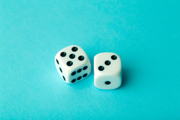 Dice on a blue background. Game, business, solutions, concept. Copy space.