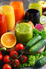 Glasses with fresh organic vegetable and fruit juices