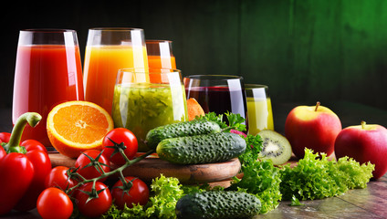 Glasses with fresh organic vegetable and fruit juices