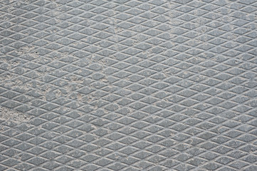 gray concrete block with diamond pattern