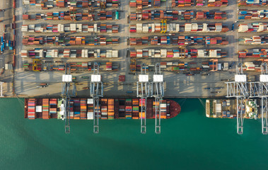 Container , container ship in export and import business and logistics. Shipping cargo to harbor by...