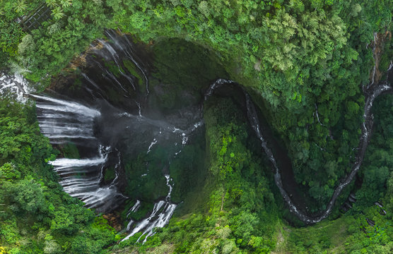 Aerial view of Tumpak Sewu waterfall in east java, Lumajang, Indonesia.