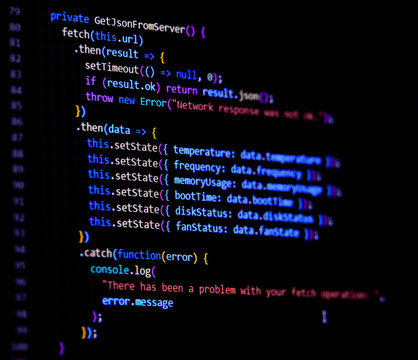 Modern Javascript, Typescript, Ecma script code with React Framework. Async with fetch. Software programming source code on computer screen..