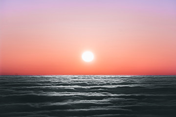 Sunset over the pacific ocean during a temperature inversion