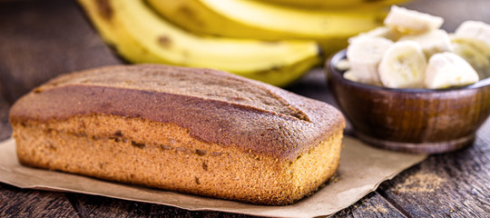 homemade banana cake with banana slices around. Portuguese cake made at home.