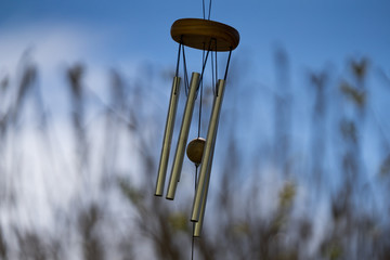 Wind Chimes blowing in the summer air. Natural background. Windy day. Melodic music with tubes....