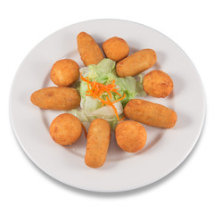 Plate of mixed ham and cod croquettes with lettuce.