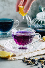 Pea flower tea in a beautiful glass cup, blue tea