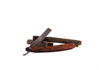 Old razor with sheath isolated on white background