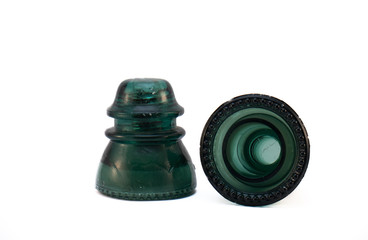 Two antique glass insulators from a telephone line