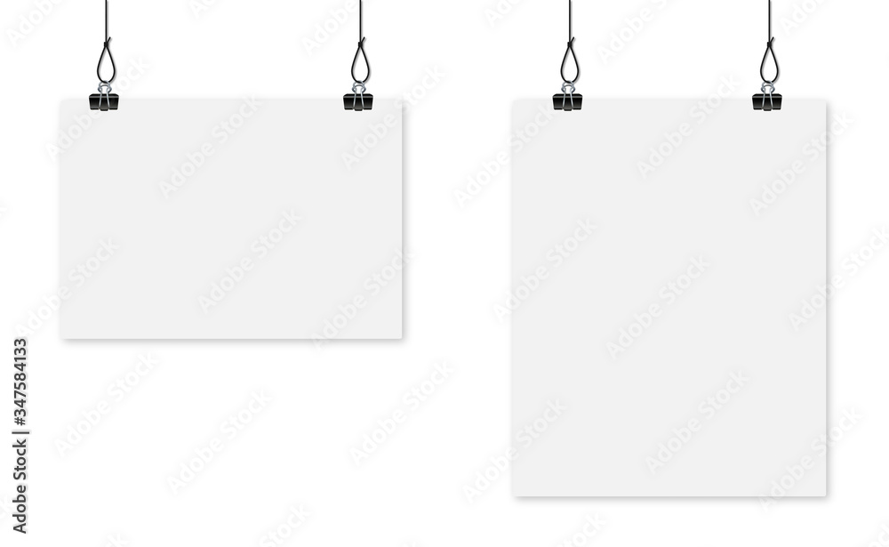 Wall mural Paper sheet hanging on clip on the white background. Blank white poster template. Advertising banner.