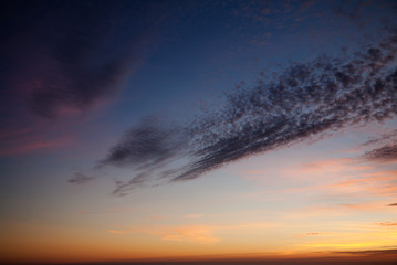 Naklejka na ściany i meble Cloud detail of a sunset, Portugal