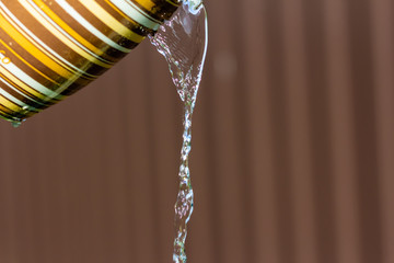 The stream of water is outpoured from groups