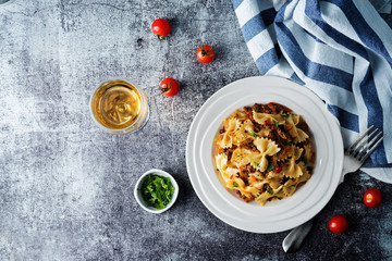 Minced beef tomato sauce pasta in a white plate