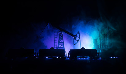 Train moving in fog. Ancient steam locomotive in night. Night train moving on railroad. orange fire background. Horror mystical scene